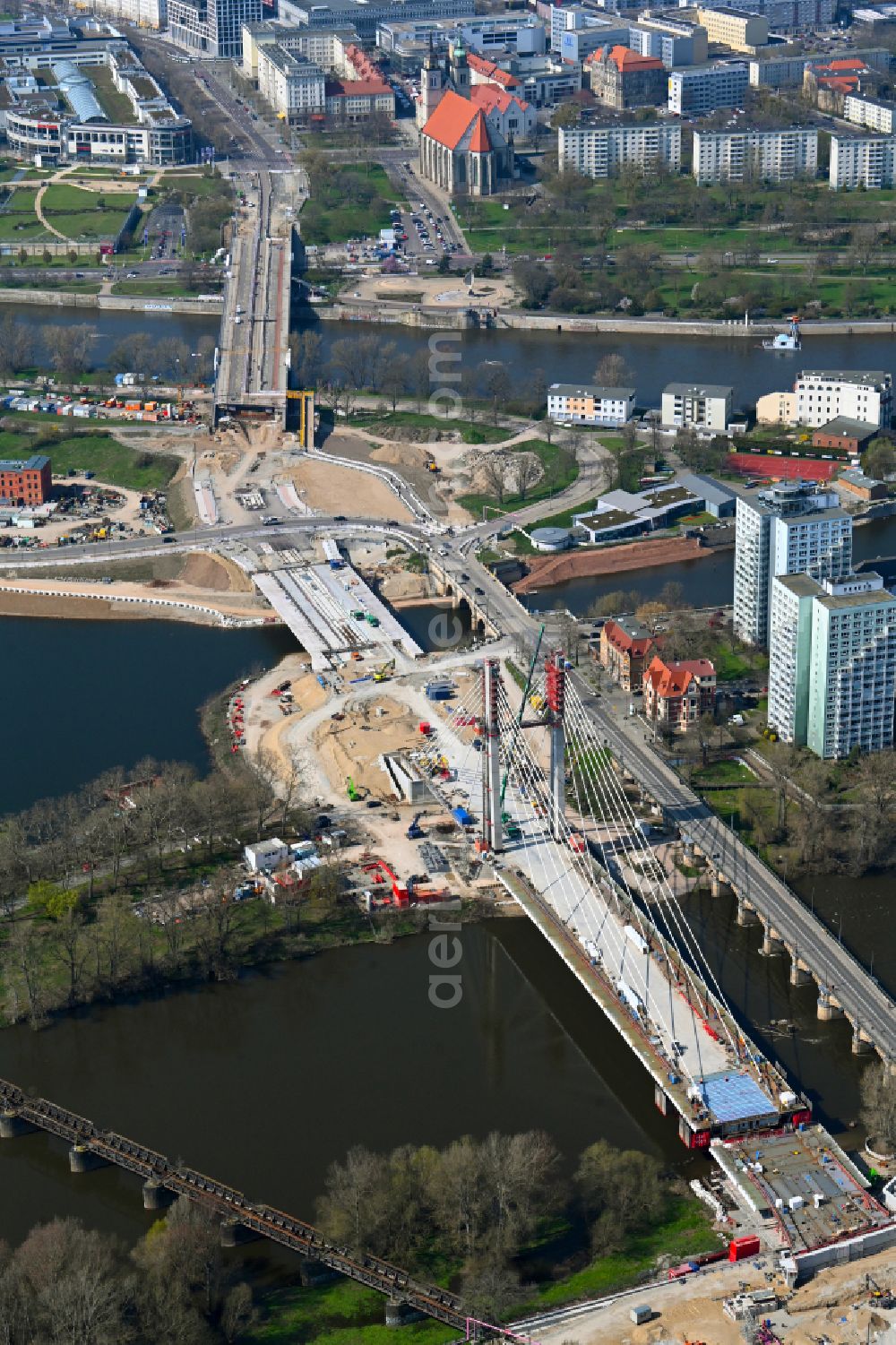 Aerial image Magdeburg - Construction site for the new construction of the road bridges - route and routing of the replacement power bridge train as a pylon bridge named Kaiser-Otto-Bridge and Queen-Editha-Bridge over the Zollelbe and the Alte Elbe on the Mittelstrasse in the district Werder in Magdeburg in the state Saxony- Anhalt, Germany