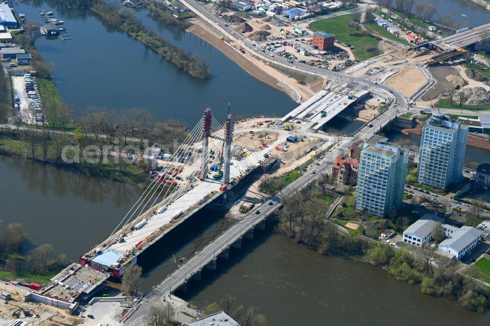 Magdeburg from above - Construction site for the new construction of the road bridges - route and routing of the replacement power bridge train as a pylon bridge named Kaiser-Otto-Bridge and Queen-Editha-Bridge over the Zollelbe and the Alte Elbe on the Mittelstrasse in the district Werder in Magdeburg in the state Saxony- Anhalt, Germany