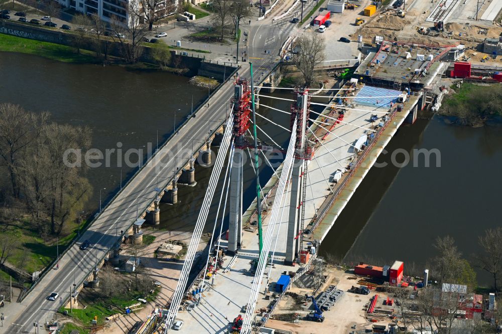 Aerial image Magdeburg - Construction site for the new construction of the road bridges - route and routing of the replacement power bridge train as a pylon bridge named Kaiser-Otto-Bridge and Queen-Editha-Bridge over the Zollelbe and the Alte Elbe on the Mittelstrasse in the district Werder in Magdeburg in the state Saxony- Anhalt, Germany