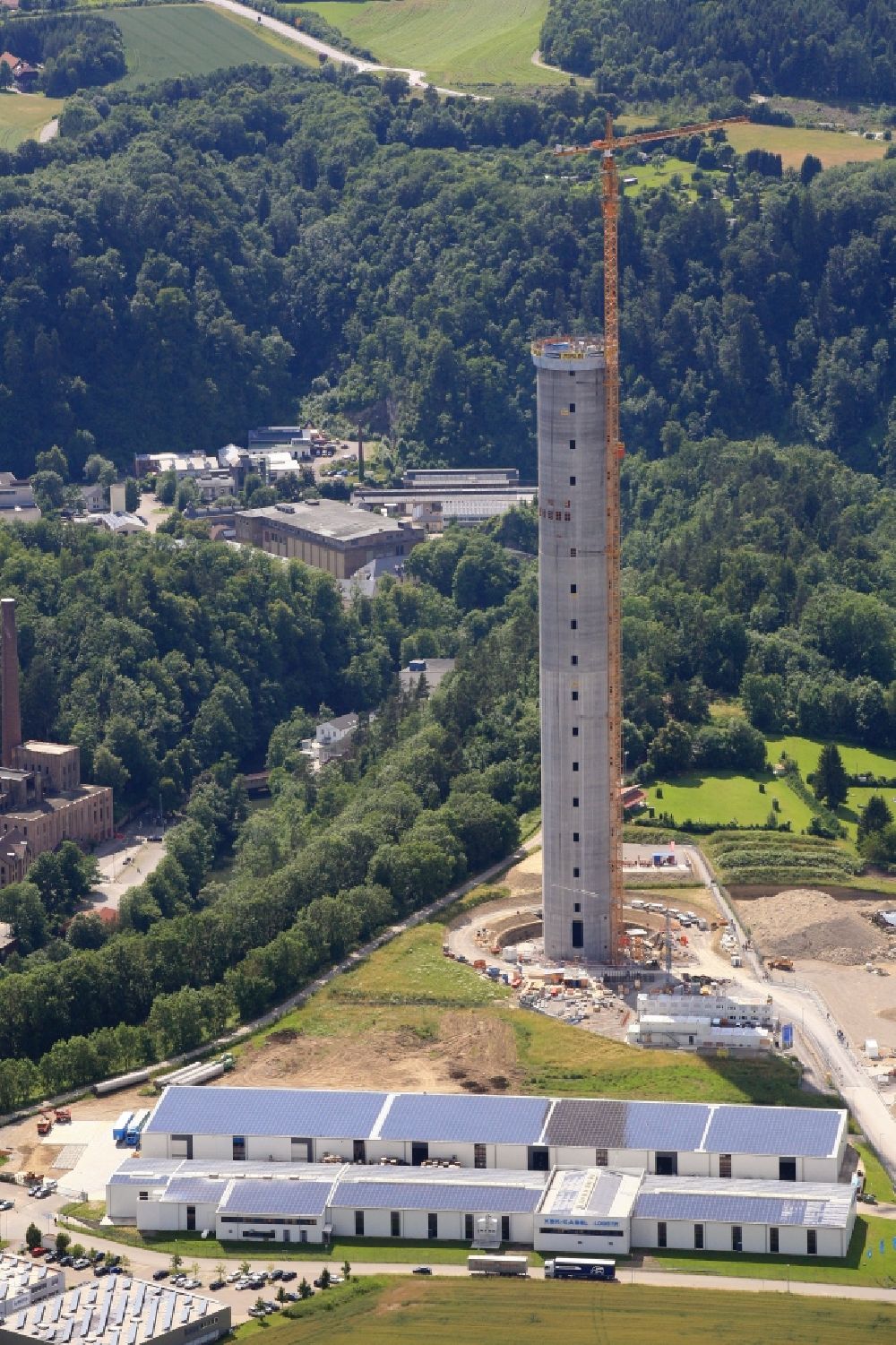 Aerial photograph Rottweil - Construction and construction site of the ThyssenKrupp testing tower for Speed elevators in Rottweil in Baden - Wuerttemberg. When finished the new landmark of the town of Rottweil will be the tallest structure in Baden-Wuerttemberg