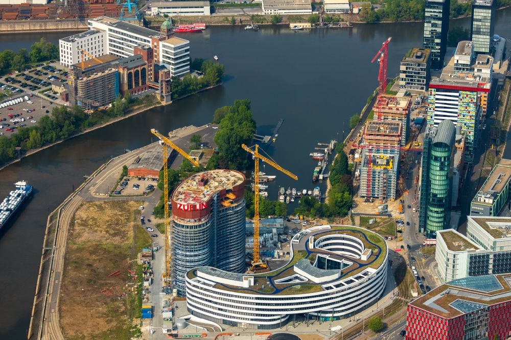 Düsseldorf from the bird's eye view: Construction site for the new building trivago-Zentrale on Kesselstrasse in the district Medienhafen in Duesseldorf in the state North Rhine-Westphalia