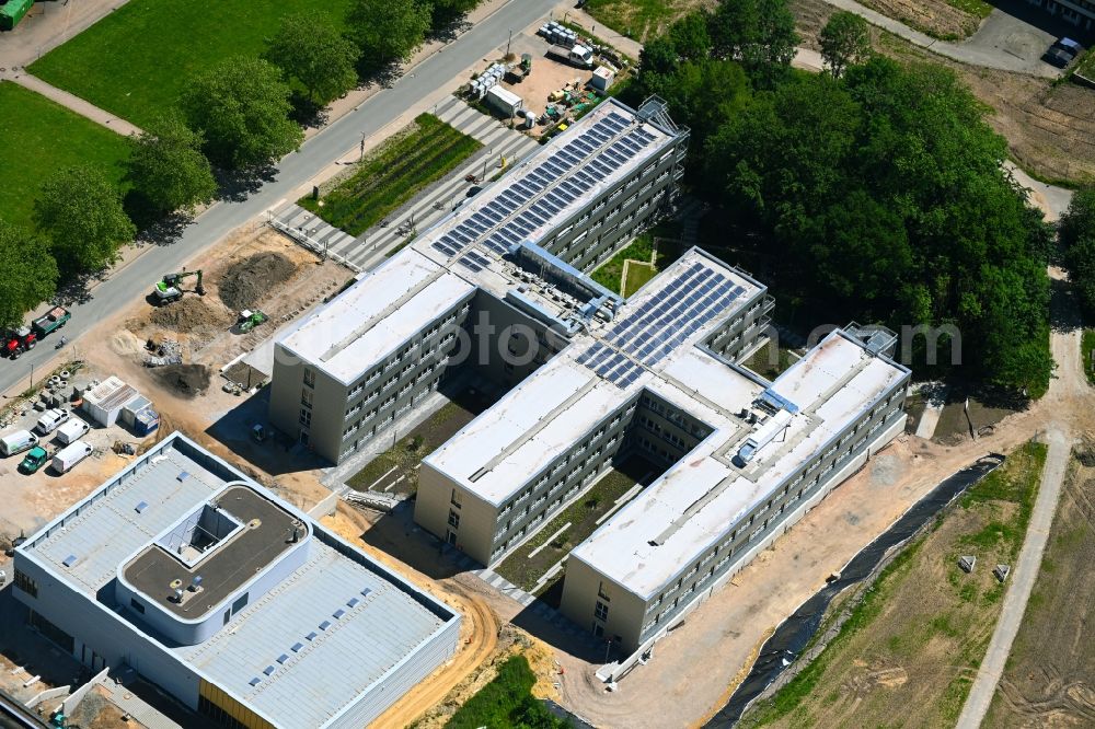 Bielefeld from the bird's eye view: Complementary new construction site on the campus-university building complex Gebaeude Z on Konsequenz in Bielefeld in the state North Rhine-Westphalia, Germany