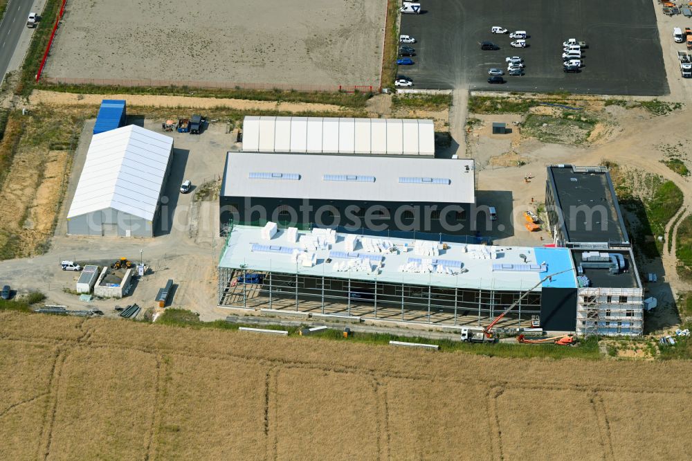 Altlandsberg from the bird's eye view: New construction of the company administration building of the RPG Unternehmensgruppe An der Muehle in Altlandsberg in the state Brandenburg, Germany