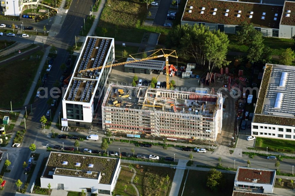 Aerial photograph Berlin - New construction of the company administration building of BAUER Elektroanlagen Holding GmbH on Karl-Ziegler-Strasse in the district Johannisthal in Berlin, Germany