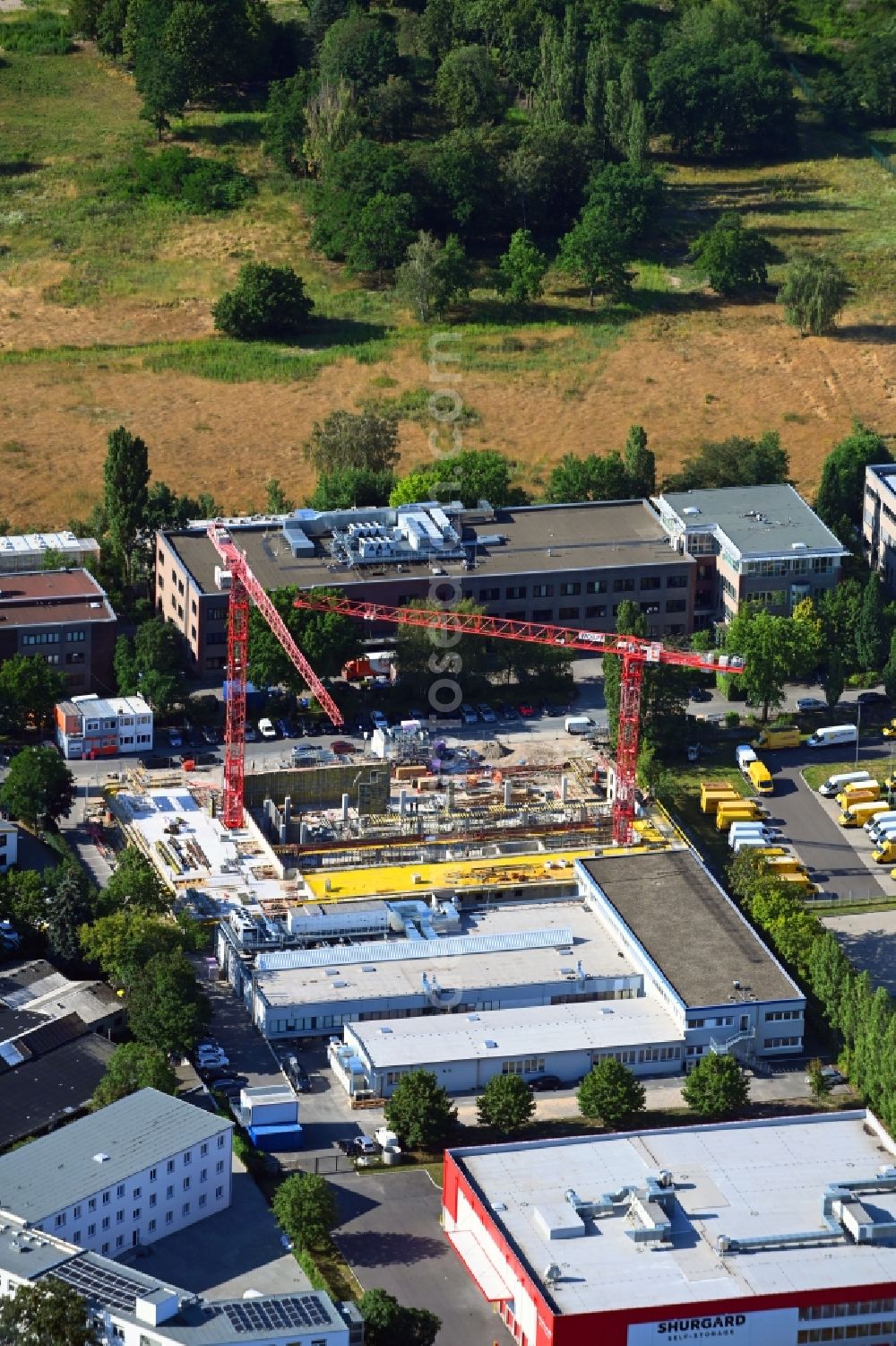 Aerial image Berlin - New construction of the company administration building of Berliner Glas KGaA Herbert Kubatz GmbH & Co. on Waldkraiburger Strasse in the district Britz in Berlin, Germany