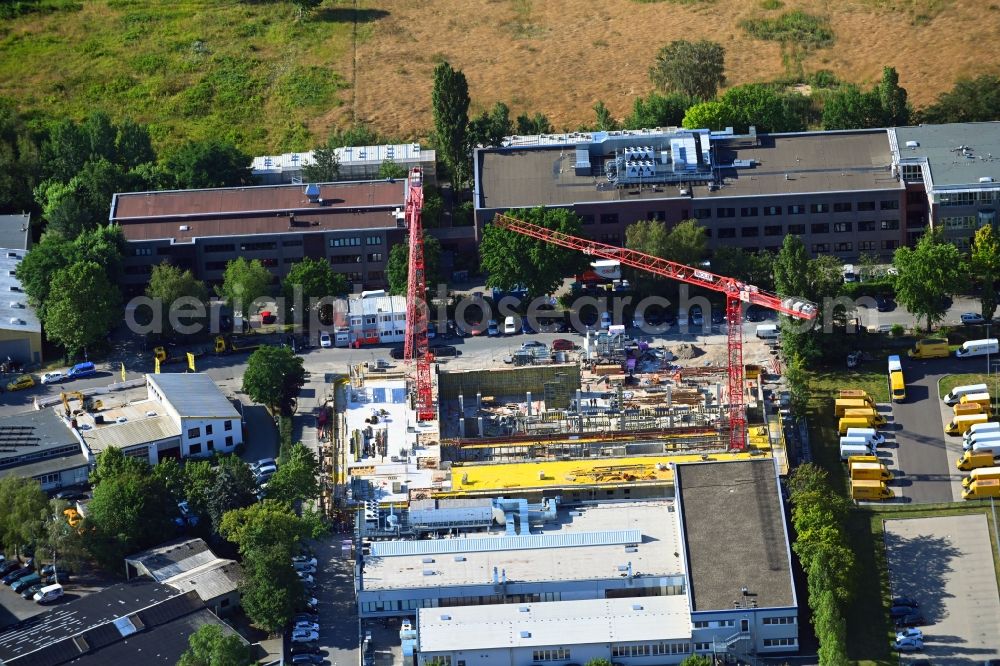 Aerial photograph Berlin - New construction of the company administration building of Berliner Glas KGaA Herbert Kubatz GmbH & Co. on Waldkraiburger Strasse in the district Britz in Berlin, Germany