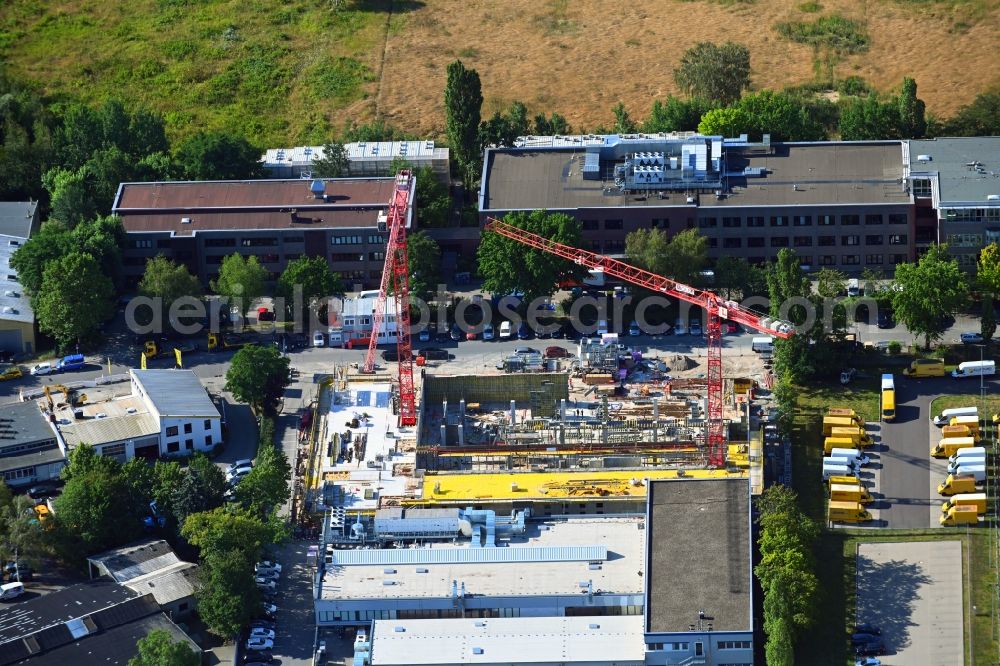 Berlin from above - New construction of the company administration building of Berliner Glas KGaA Herbert Kubatz GmbH & Co. on Waldkraiburger Strasse in the district Britz in Berlin, Germany