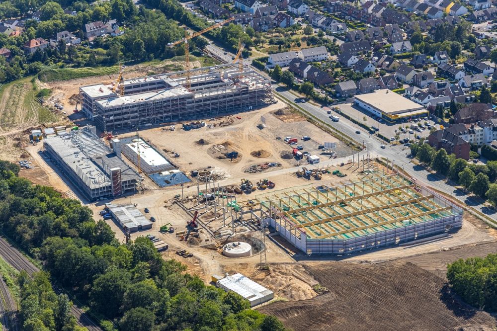 Aerial photograph Moers - New construction of the company administration building of EDEKA Handelsgesellschaft Rhein-Ruhr mbH on Rheinberger Strasse in the district Repelen in Moers in the state North Rhine-Westphalia, Germany