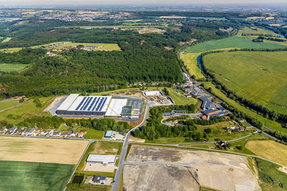 Aerial photograph Arnsberg - New construction of the company administration building and Logistikzentrums of TRIO Leuchten GmbH on Oststrasse in Vosswinkel in the state North Rhine-Westphalia, Germany