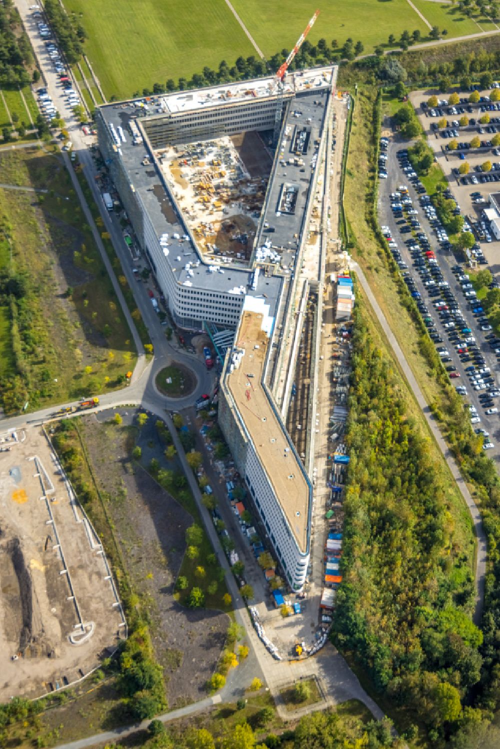 Aerial photograph Dortmund - new construction of the company administration building of Materna Information & Communications SE on street Robert-Schuman-Strasse in the district Phoenix West in Dortmund at Ruhrgebiet in the state North Rhine-Westphalia, Germany