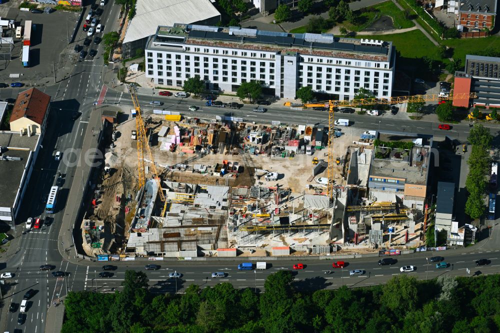 Nürnberg from above - Construction site of banking administration building of the financial services company Evenord-Bank next to the hotel complex the niu Leo Am Leonhardspark - Schwabacher Strasse on the former Schlachthofstrasse in Nuremberg in the state Bavaria, Germany