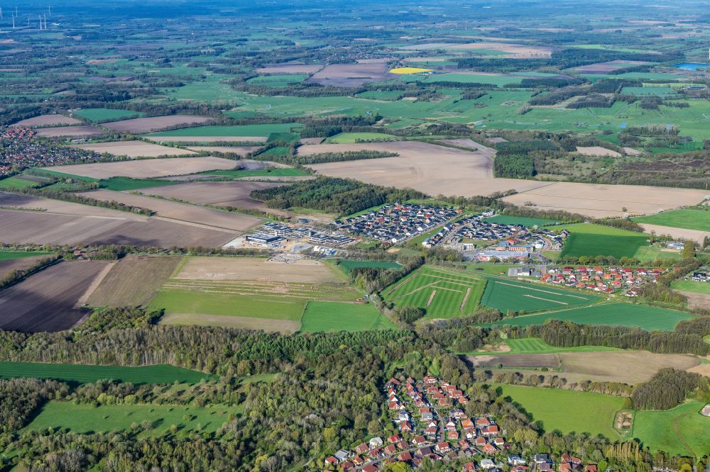 Stade from the bird's eye view: Construction site of residential area of single-family settlement Heidesiedlung in the district Riensfoerde in Stade in the state Lower Saxony, Germany