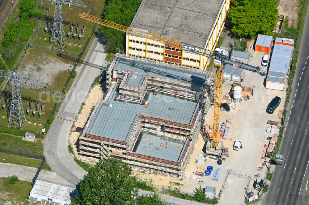 Aerial photograph Berlin - New construction of a residential and commercial building on street Maerkische Allee in the district Marzahn in Berlin, Germany