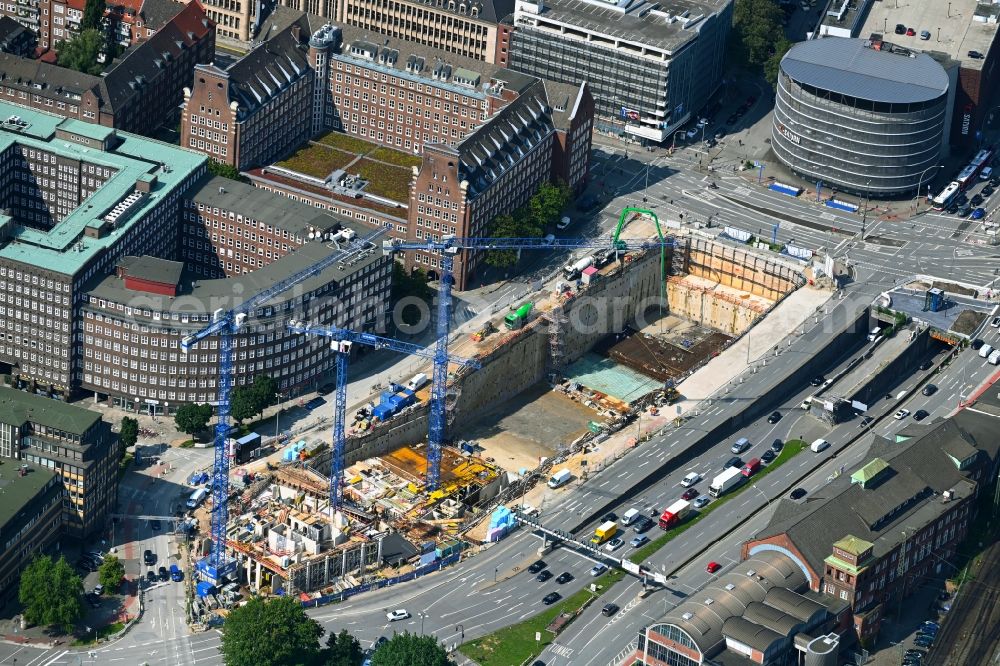 Hamburg from the bird's eye view: Construction site for the construction of a multi-family residential and commercial building Johannis-Kontor at Deichtorplatz in the old town in Hamburg, Germany