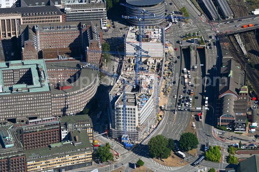 Hamburg from the bird's eye view: Construction site for the construction of a multi-family residential and commercial building Johannis-Kontor at Deichtorplatz in the old town in Hamburg, Germany