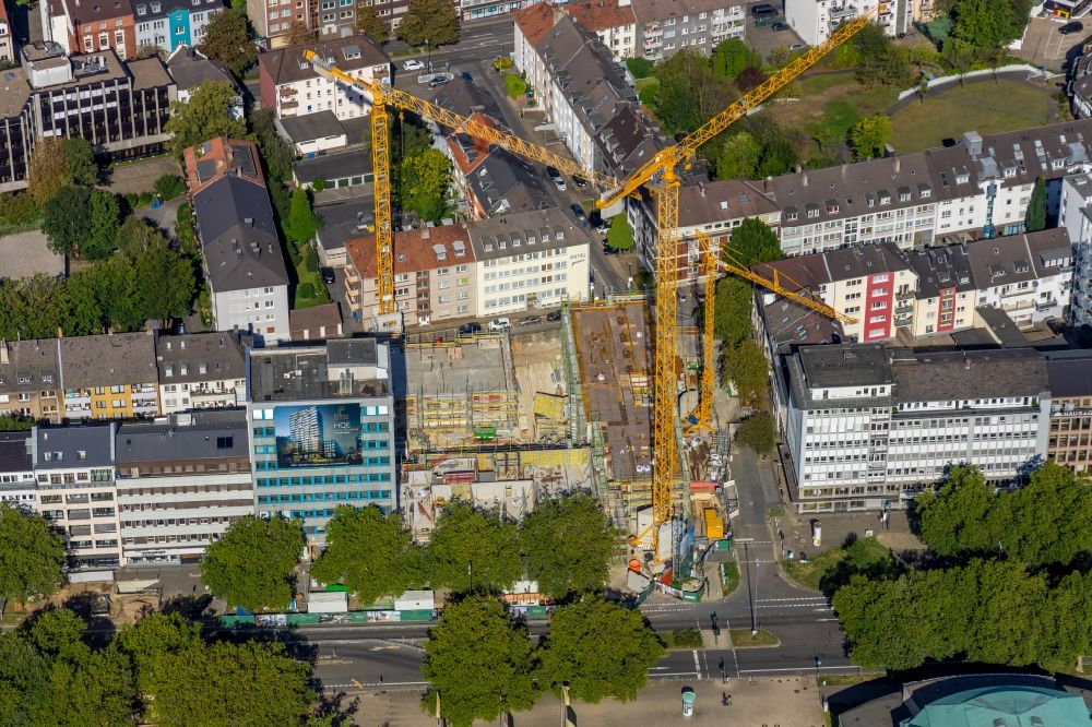 Essen from above - New construction of a residential and commercial building Huyssenallee - corner Heinrichstrasse in Essen in the state North Rhine-Westphalia, Germany