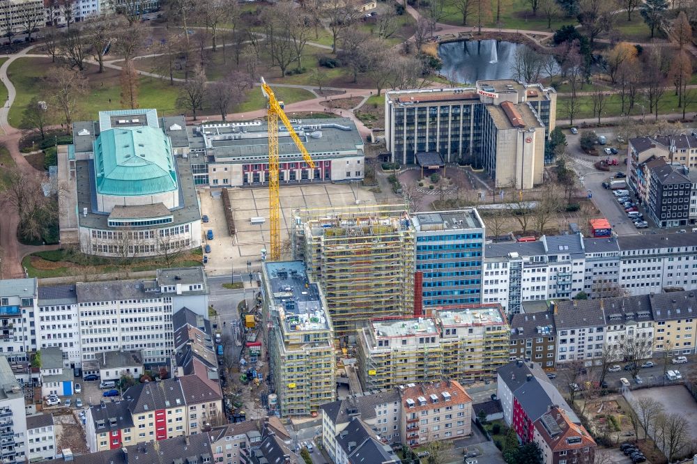 Essen from above - Construction site to build a new residential and commercial building HQE Huyssen Quartier Essen with residential tower and senior citizens' apartments on Huyssenallee - corner of Heinrichstrasse in Essen in the Ruhr area in the state North Rhine-Westphalia, Germany