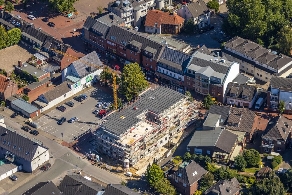 Bottrop from above - New construction of a residential and commercial building of Kirchhellener Arkaden on Schulstrasse corner Kirchstrasse in the district Kirchhellen in Bottrop in the state North Rhine-Westphalia, Germany