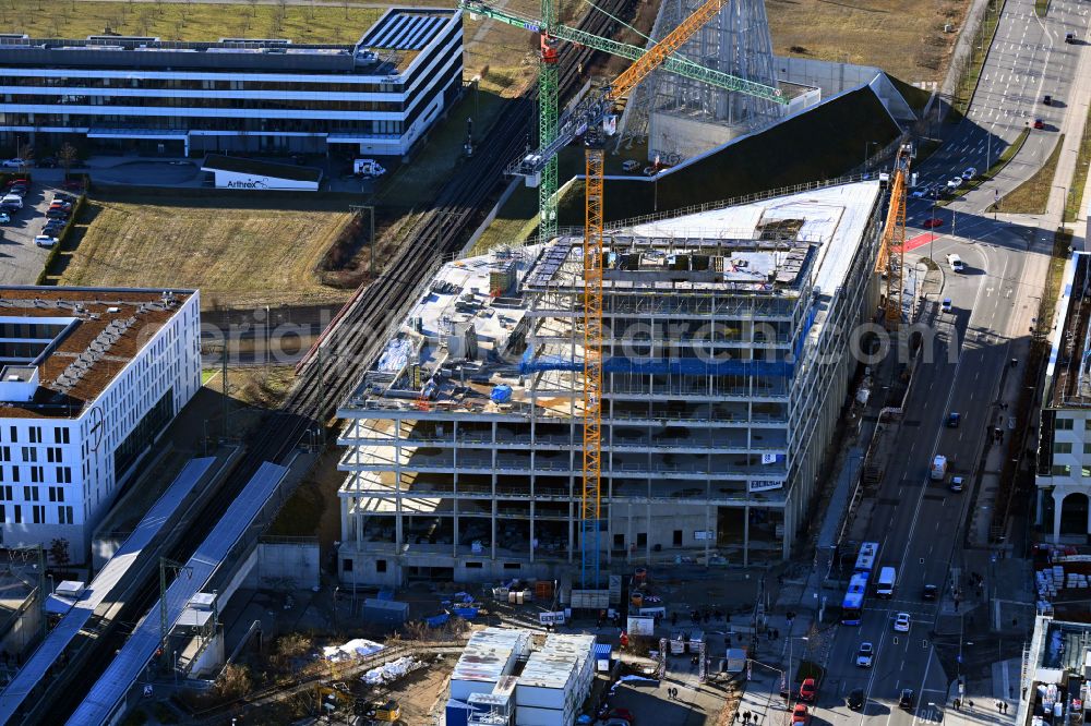 München from the bird's eye view: New construction of a residential and commercial building on street Emilie-Maurer-Strasse - Bodenseestrasse in the district Freiham in Munich in the state Bavaria, Germany