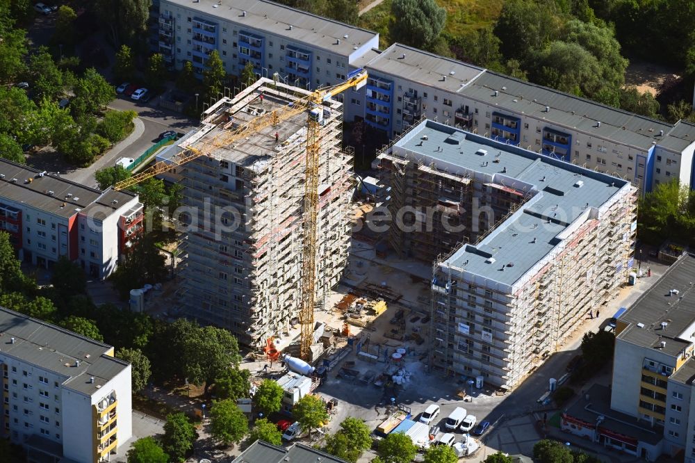 Aerial photograph Berlin - Construction site for the new residential and commercial building on Kastanienboulevard - Auerbacher Ring - Schneeberger Strasse in the district Hellersdorf in Berlin, Germany
