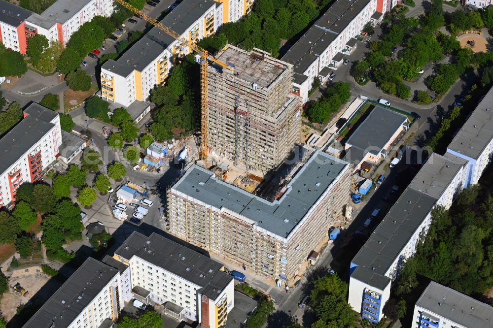 Aerial photograph Berlin - Construction site for the new residential and commercial building on Kastanienboulevard - Auerbacher Ring - Schneeberger Strasse in the district Hellersdorf in Berlin, Germany