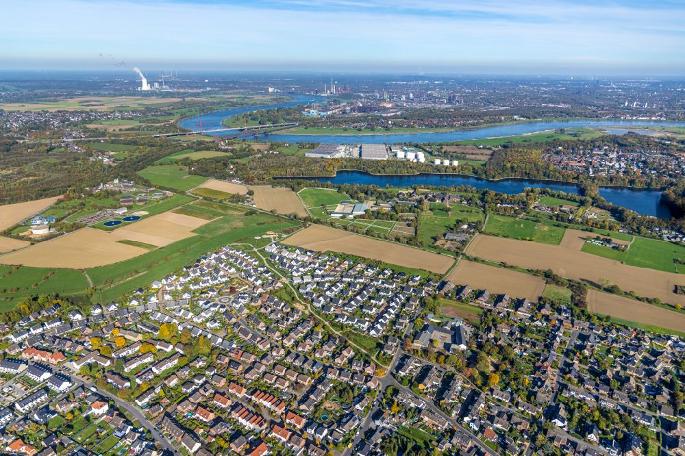 Moers from above - Construction sites for new construction residential area of detached housing estate along Planetenstrasse in Moers in the state of North Rhine-Westphalia