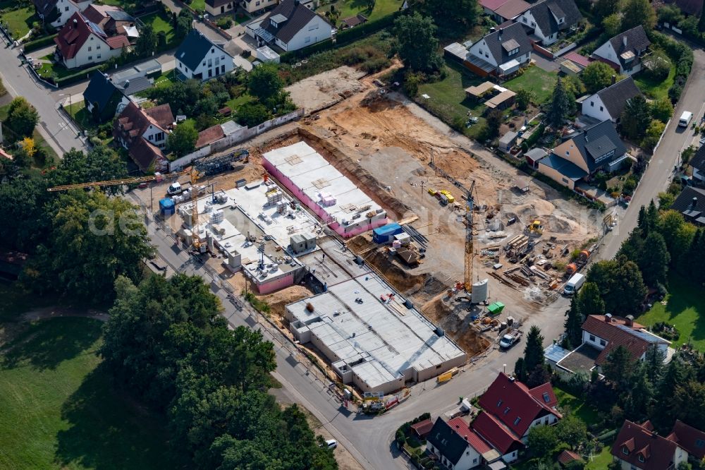 Rednitzhembach from the bird's eye view: Construction site of a new residential area of the terraced housing estate on Schwander Strasse - Ganghofer Strasse in Rednitzhembach in the state Bavaria, Germany