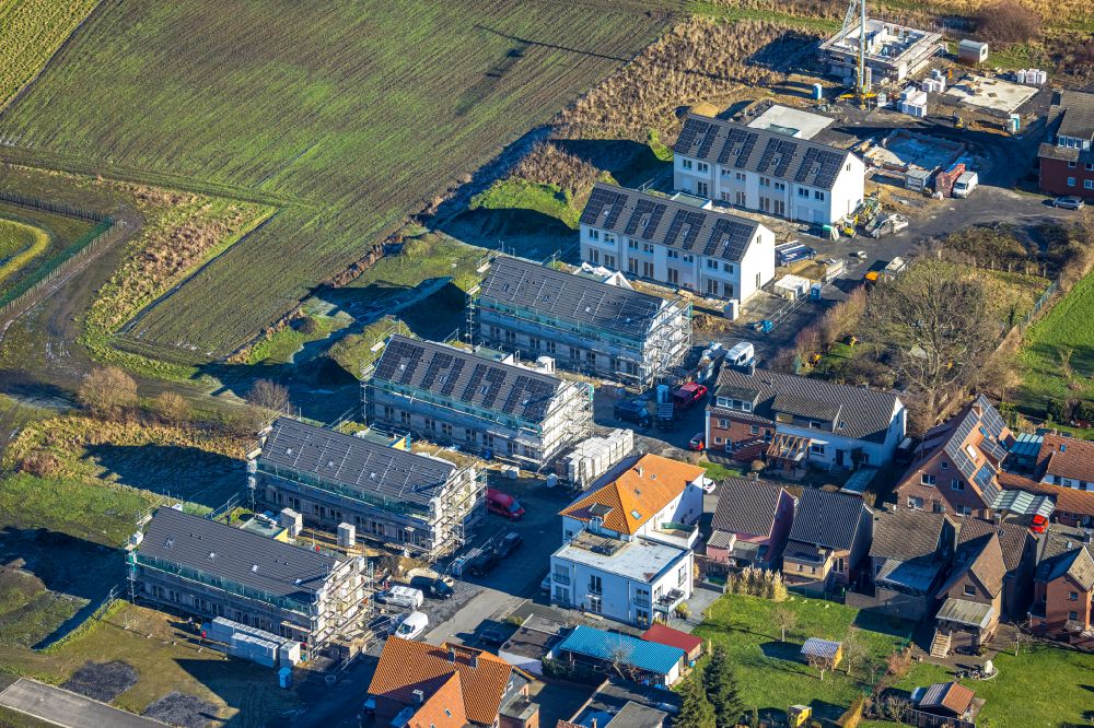 Aerial image Werne - Construction site of a new residential area of the terraced housing estate An of Wiebecke on street Brevingstrasse in Werne at Ruhrgebiet in the state North Rhine-Westphalia, Germany