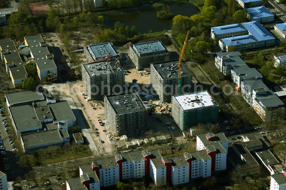 Aerial photograph Berlin - Building-ensemble-construction for the construction of a new city quarter Theodor Quartier on Senftenberger Ring in the district Maerkisches Viertel in Berlin, Germany