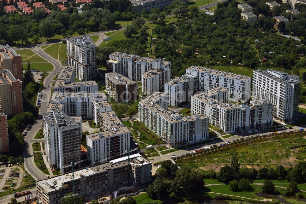 Aerial image Warschau - Newly built residential area in the Praga Poludnie in the East of Warsaw in Poland. The multi-storey residential buildings are located on a green near Lake Goclawskie surrounded by small gardens, meadows and a forest area. The Apartamenty Saska nad Jeziorem were designed and are managed by Dom Development