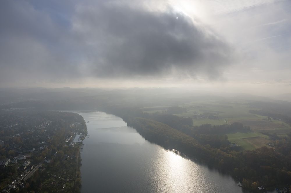 Essen from the bird's eye view: A thick layer of autumn weather clouds covers the lake Baldeneysee between the Essen districts Kupferdreh and the Ruhr peninsular Heisingen in the state North Rhine-Westphalia