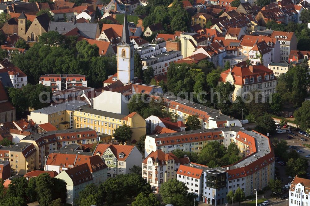 Aerial photograph Erfurt - In the residential area on the hill in the old town of Erfurt in Thuringia is the Nikolaiturm the residue of a former parish church. To the right, in the Art Nouveau building, the Arts and Crafts School Erfurt, also Hill School has named their headquarters. She is now part of the University of Erfurt. Further afield is seen with the St. Michael's Church, the University Church of Erfurt