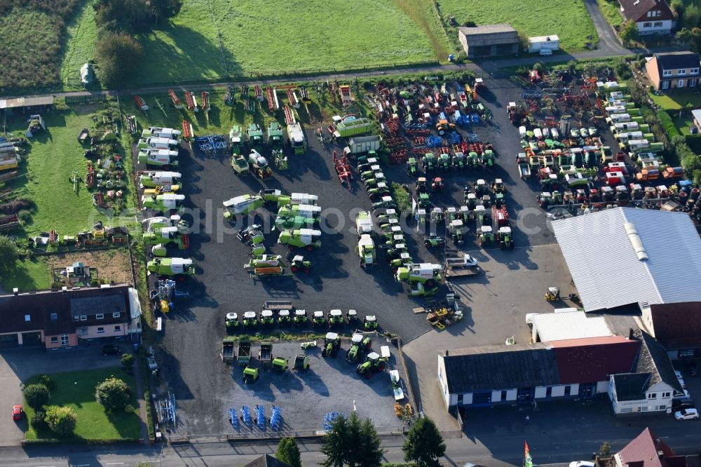 Weimar (Lahn) from the bird's eye view: Commercial Vehicle and Special Vehicle trade of Justus Becker GmbH on Giessener Strasse in Weimar (Lahn) in the state Hesse, Germany