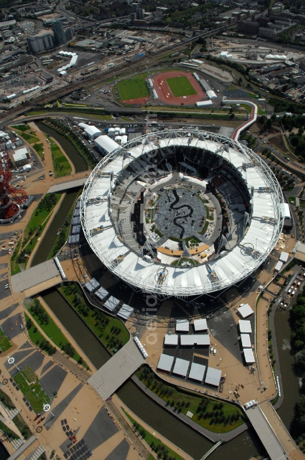Aerial image London - The Olympic Stadium in Olympic Park, London, England, is designed to be the centrepiece of the 2012 Summer Olympics and 2012 Summer Paralympics, and the venue of the athletic events as well as the Olympic Games opening and closing ceremonies in Great Britain