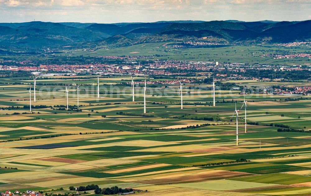 Herxheimweyher from the bird's eye view: City view Uebersicht of Felof bai with silhouette of a group of wind power plants in Herxheimweyher in the state Rhineland-Palatinate, Germany