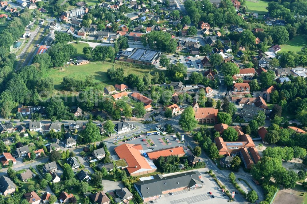 Aerial photograph Bispingen - Town View of the streets and houses of the residential areas along the Toepinger Strasse and the Soltauer Strasse in Bispingen in the state Lower Saxony