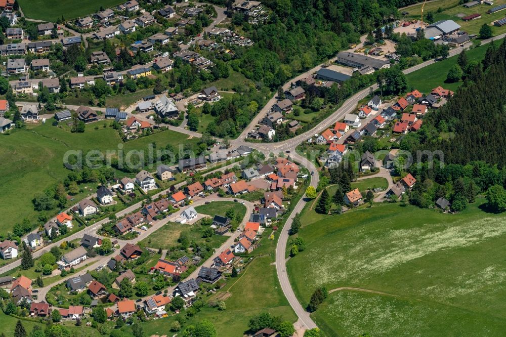 Aerial image Brigach - Surrounded by forest and forest areas center of the streets and houses and residential areas in Brigach in the state Baden-Wuerttemberg, Germany