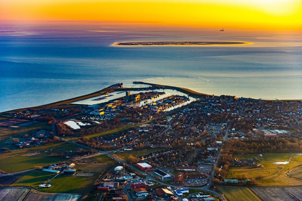 Aerial image Büsum - City view of the streets and houses of the residential areas behind the three basins of the Buesum harbor in the sunset in Buesum in the state of Schleswig-Holstein