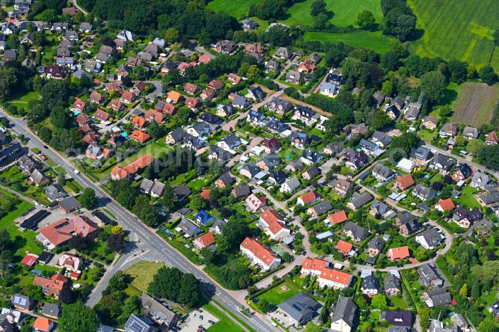 Egenbüttel from the bird's eye view: Town View of the streets and houses of the residential areas in Egenbuettel in the state Schleswig-Holstein, Germany