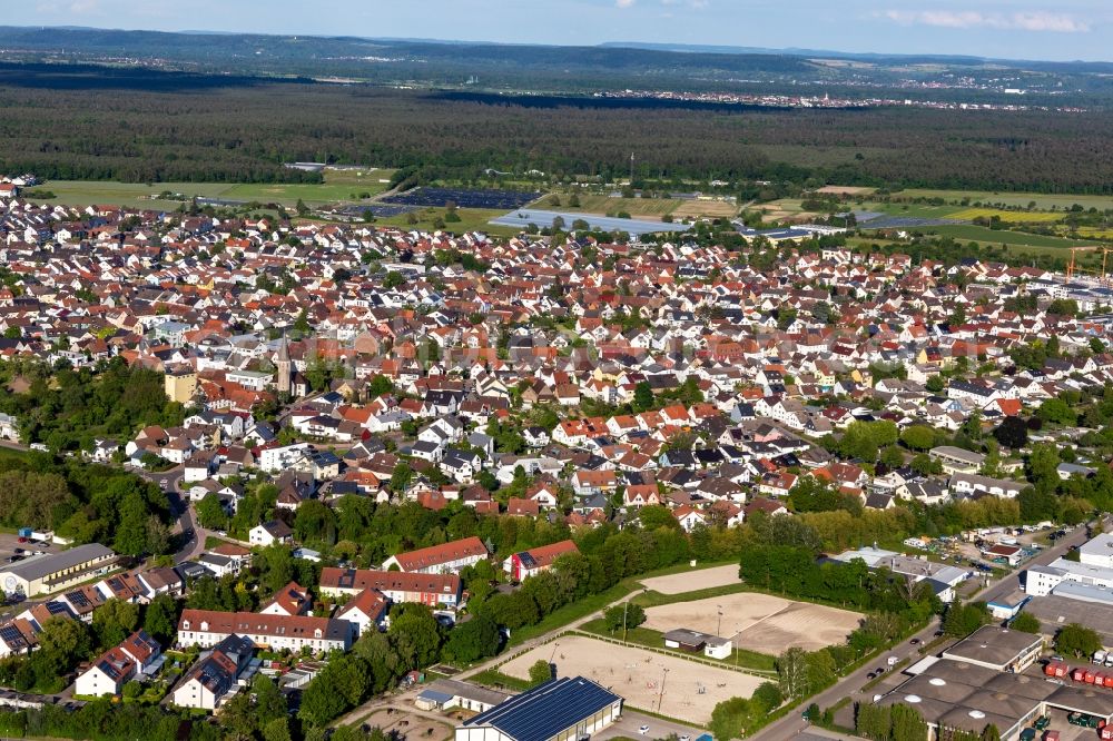 Aerial photograph Eggenstein - Town View of the streets and houses of the residential areas in Eggenstein in the state Baden-Wuerttemberg, Germany