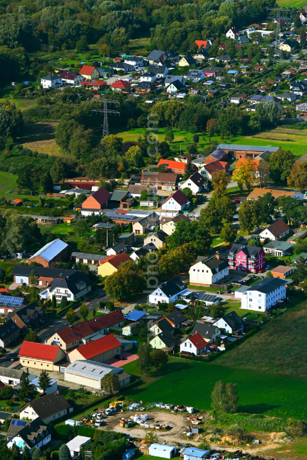 Aerial image Eiche - City view of the streets and houses of the residential areas along the Eichner Dorfstrasse in Eiche in the state Brandenburg, Germany