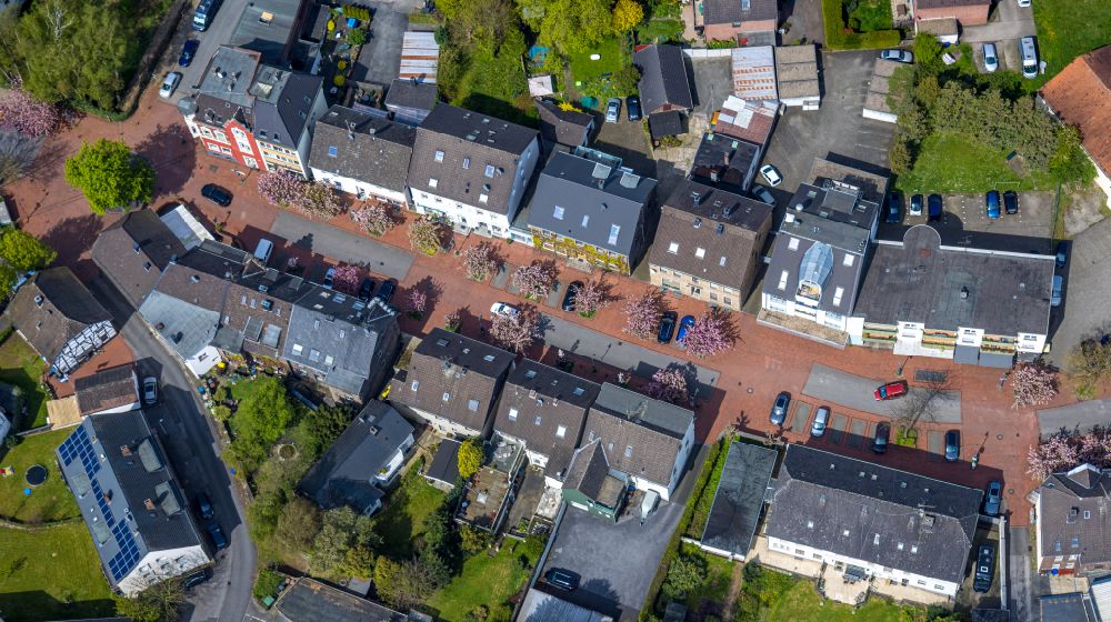 Aerial image Herbede - Town view of the streets and houses of the residential areas along the Meesmannstrasse with blossoming Japanese cherry trees in Herbede in the Ruhr area in the state of North Rhine-Westphalia, Germany