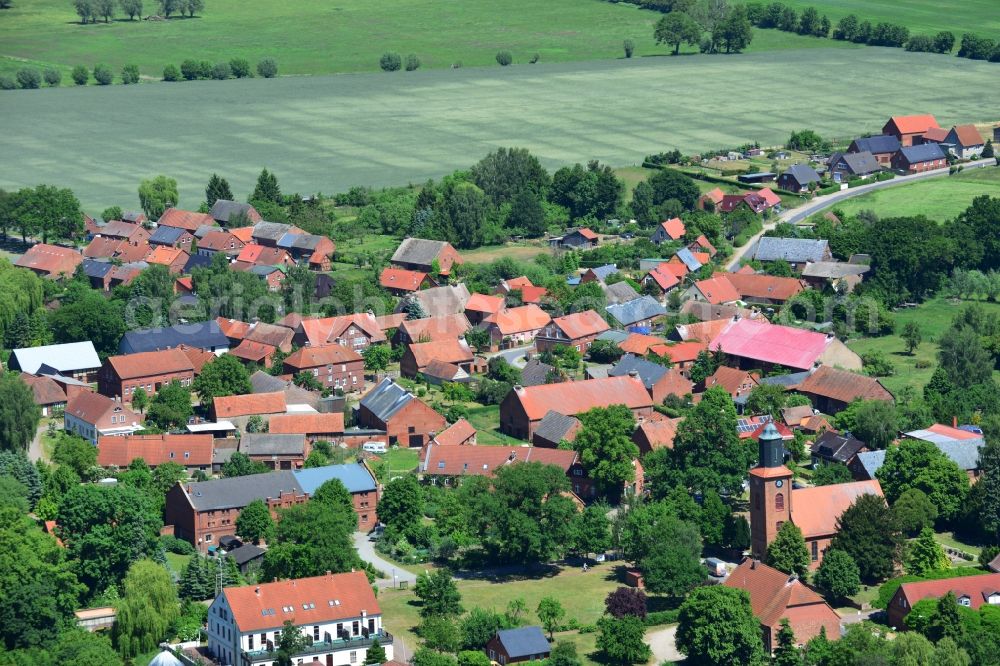 Rühstädt from the bird's eye view: View of the borough of Ruehstaedt in the state of Brandenburg. The village is located in the county district of Prignitz, is characterised by small houses and farms and is surrounded by fields and forest