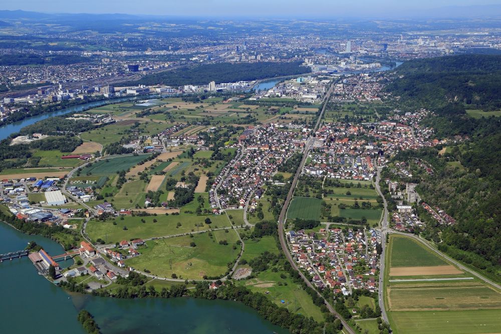 Aerial image Grenzach-Wyhlen - Town view of the two districts Grenzach and Wyhlen in Grenzach-Wyhlen at the Rhine river in the state Baden-Wurttemberg, Germany. In the Background the city of Basle in Switzerland