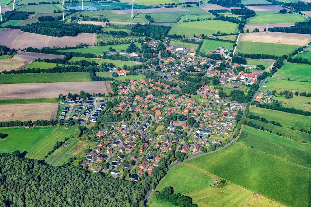 Helmste from above - Town View of the streets and houses of the residential areas in the district Helmste in Deinste in the state Lower Saxony, Germany