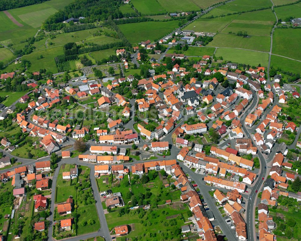 Herbstein from above - Town View of the streets and houses of the residential areas in Herbstein in the state Hesse, Germany