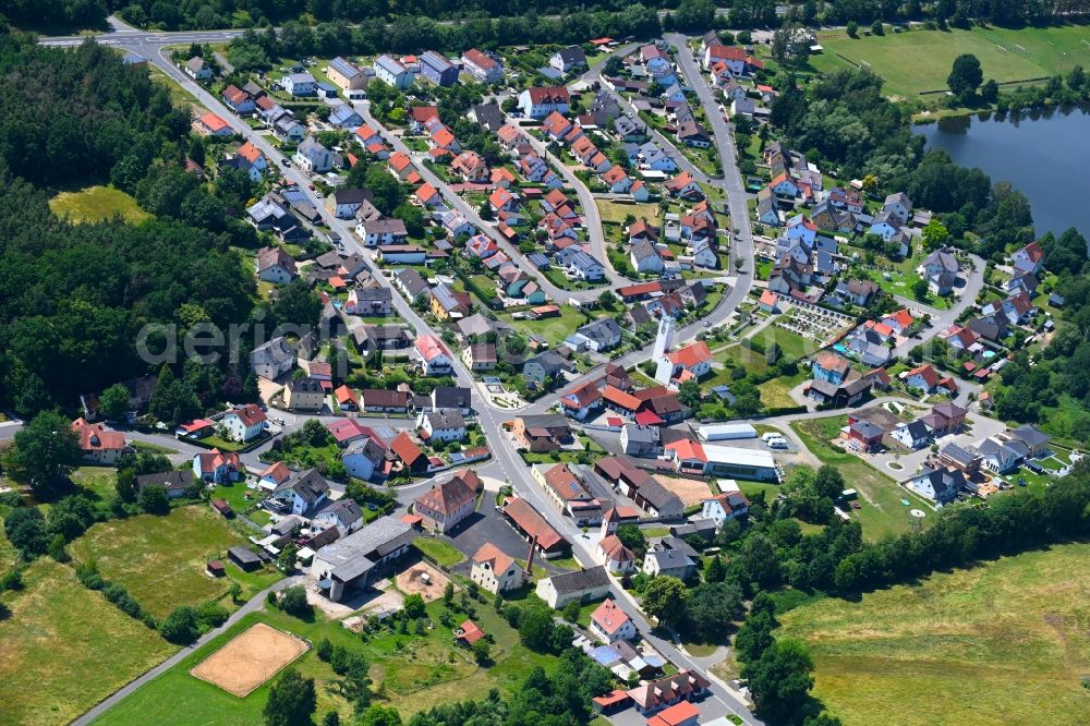 Aerial image Hütten - Town View of the streets and houses of the residential areas in Huetten in the state Bavaria, Germany