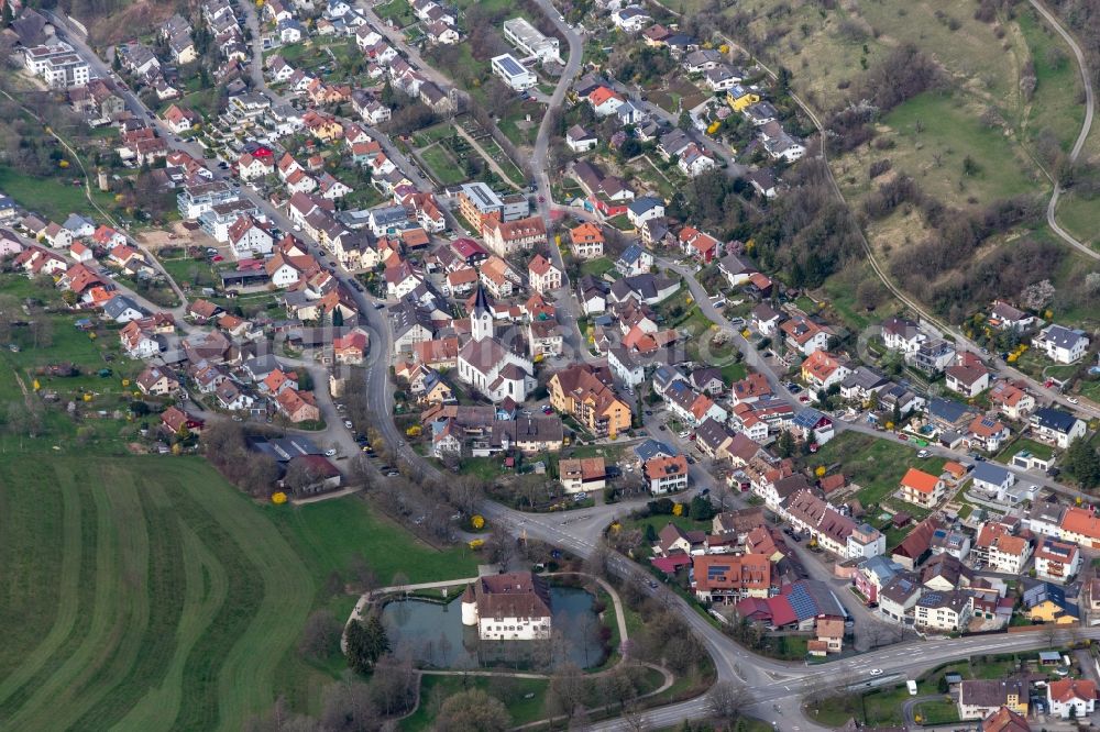 Inzlingen from the bird's eye view: Town View of the streets and houses of the residential areas and Water-castle in Inzlingen in the state Baden-Wurttemberg, Germany