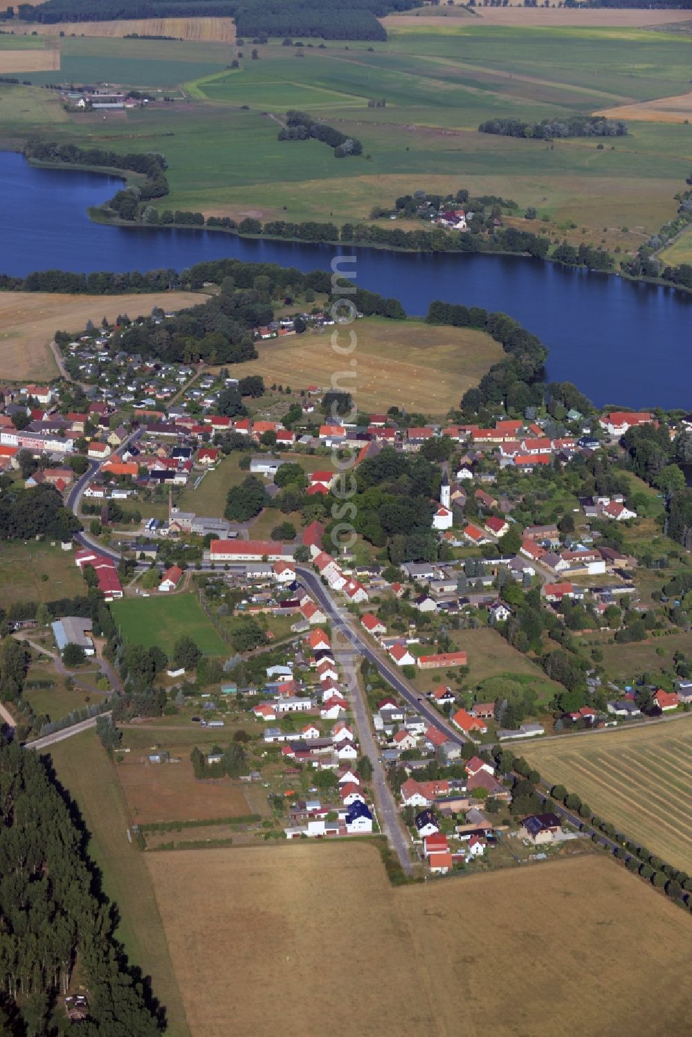 Liebenwalde from above - Town View of the streets and houses of the residential areas in Liebenwalde in the state Brandenburg. Also shown the lakes Wutzsee and Kuhpanzsee