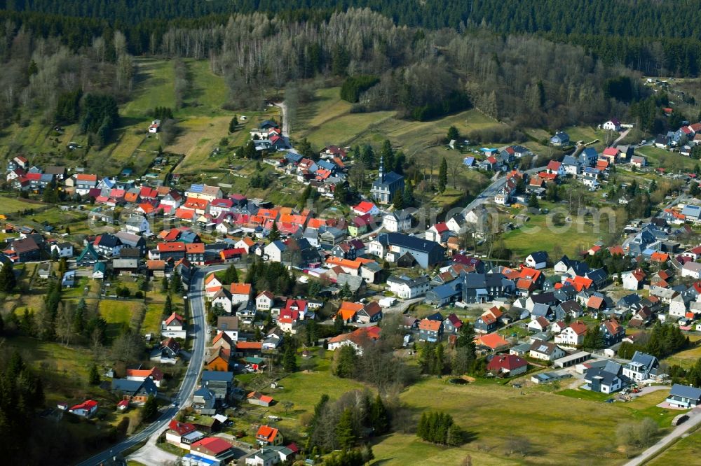 Möhrenbach from above - City view of the streets and houses of the residential areas in the landscape surrounded by mountains and forest in Moehrenbach in the state Thuringia, Germany